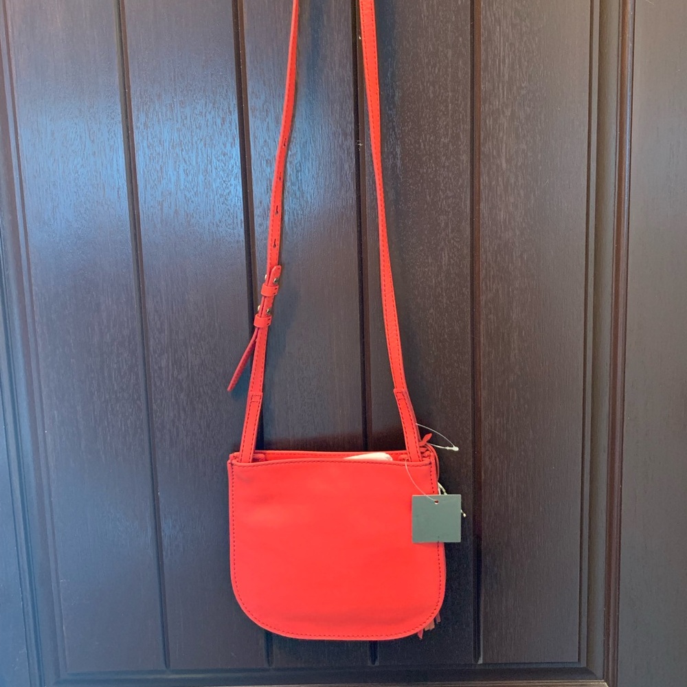 Fossil red purse.  New with tag.
